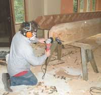 Spencer West sanding a stringer